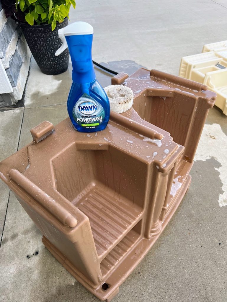 cleaning the thrifted play kitchen